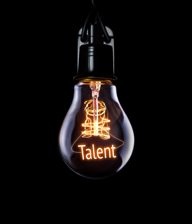 Hanging lightbulb with glowing Talent concept.