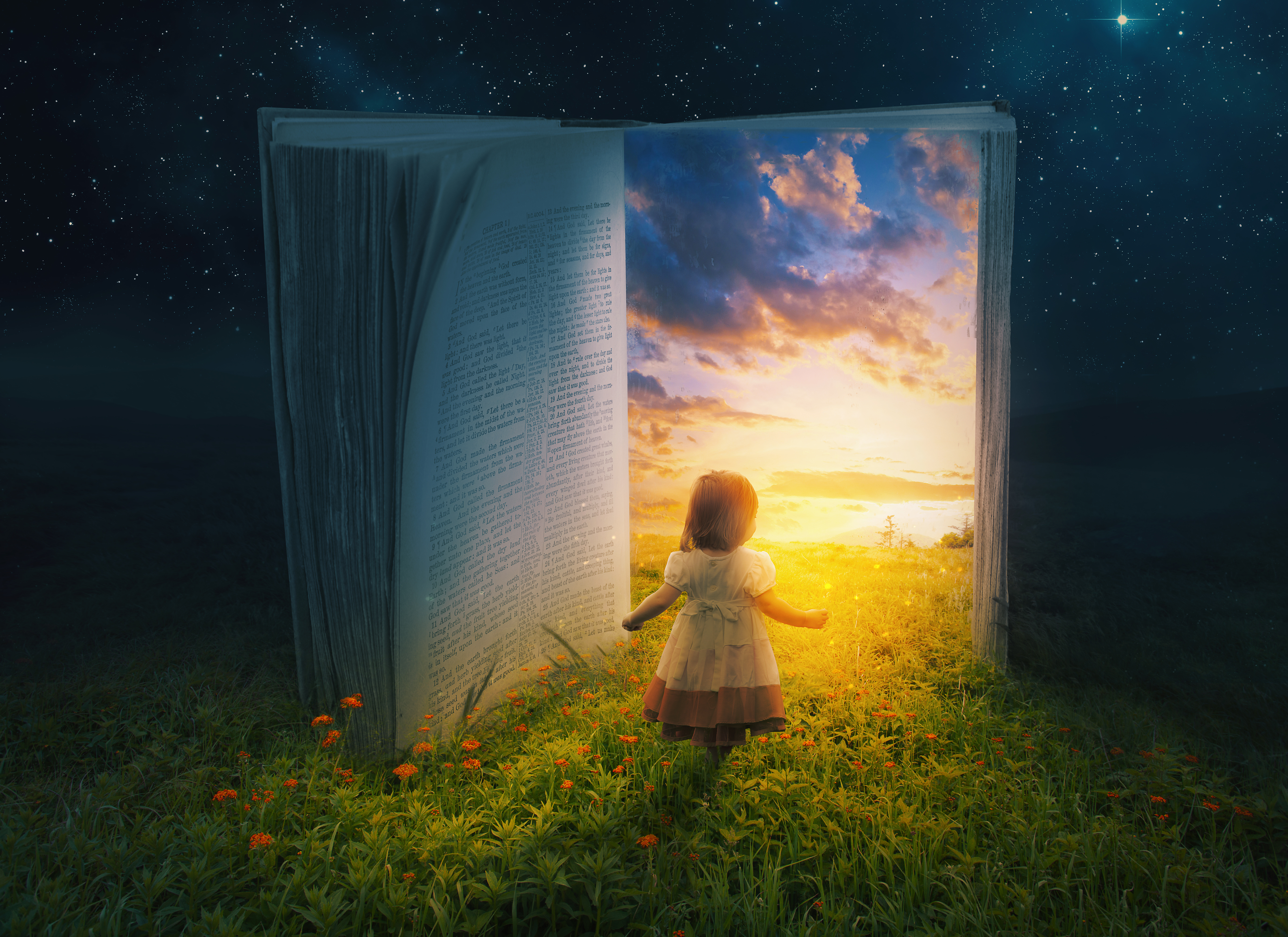 Little girl and open book